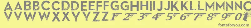 SkyfallDone-fontti – harmaat kirjasimet keltaisella taustalla