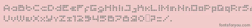 Imajix16Dot-fontti – harmaat kirjasimet vaaleanpunaisella taustalla