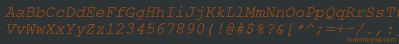 Шрифт ErKurierMacItalic – коричневые шрифты на чёрном фоне