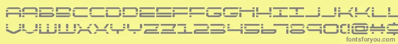 QuickquickBold-fontti – harmaat kirjasimet keltaisella taustalla