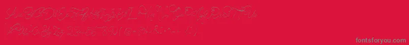 Fonte CeciliaScript – fontes cinzas em um fundo vermelho