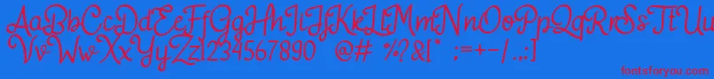 Adelitha Font – Red Fonts on Blue Background