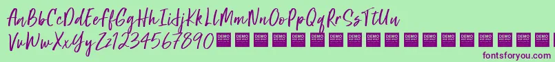 SuperNaturalDemo Font – Purple Fonts on Green Background