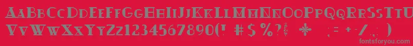 フォントOuijadork – 赤い背景に灰色の文字