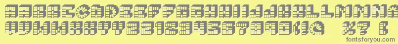 Fonte PezFont – fontes cinzas em um fundo amarelo