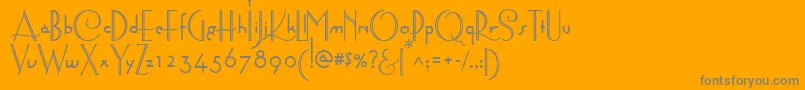 AstoriaDecoMedium-fontti – harmaat kirjasimet oranssilla taustalla