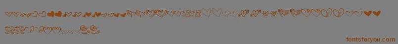 MtfHeartDoodle Font – Brown Fonts on Gray Background