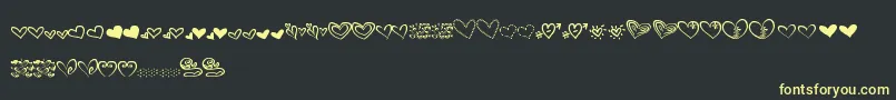 MtfHeartDoodle Font – Yellow Fonts on Black Background