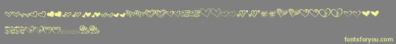 MtfHeartDoodle Font – Yellow Fonts on Gray Background