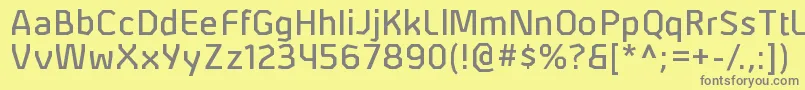 フォントAlphiirgRegular – 黄色の背景に灰色の文字