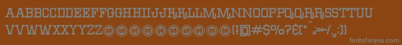 BoileddenimFfp-fontti – harmaat kirjasimet ruskealla taustalla