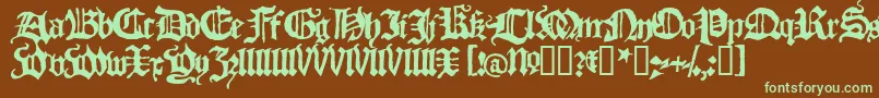 フォントBlach – 緑色の文字が茶色の背景にあります。