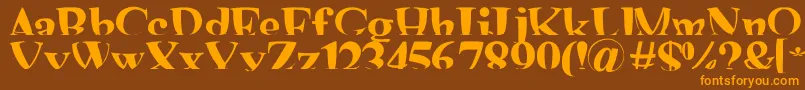 フォントMashyShona – オレンジ色の文字が茶色の背景にあります。