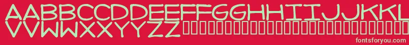 Imperfec Font – Green Fonts on Red Background