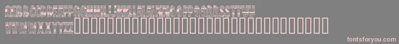 BrinetextPattern-Schriftart – Rosa Schriften auf grauem Hintergrund