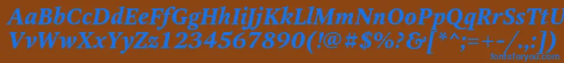 Czcionka OctavacBolditalic – niebieskie czcionki na brązowym tle