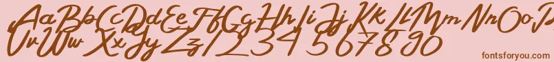 Шрифт BelladaPersonalLicense – коричневые шрифты на розовом фоне