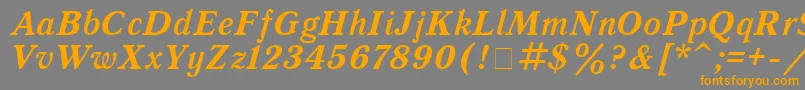 QuantantiquaBoldItalic-fontti – oranssit fontit harmaalla taustalla
