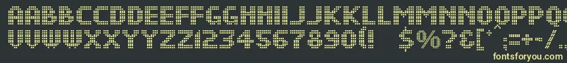 フォントDsDotsMedium – 黒い背景に黄色の文字