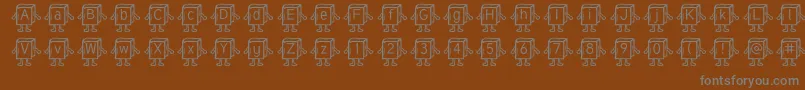 Шрифт Samysbookifiedtuffy – серые шрифты на коричневом фоне