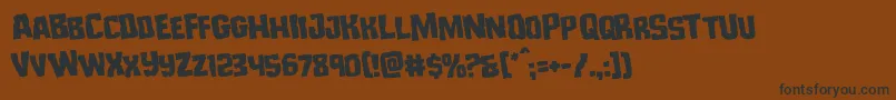 フォントMonsterhunterrotate – 黒い文字が茶色の背景にあります