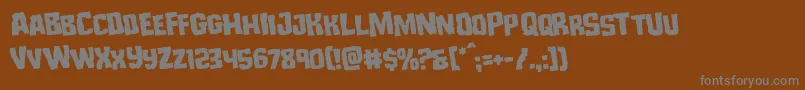 フォントMonsterhunterrotate – 茶色の背景に灰色の文字