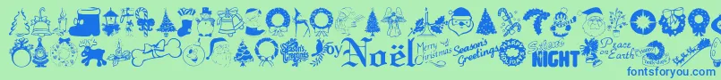 Xmastyme-Schriftart – Blaue Schriften auf grünem Hintergrund