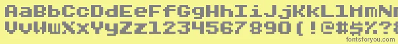 Rygarde-fontti – harmaat kirjasimet keltaisella taustalla