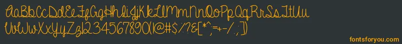 Czcionka AGentleTouch – pomarańczowe czcionki na czarnym tle