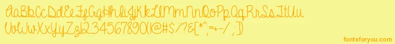 フォントAGentleTouch – オレンジの文字が黄色の背景にあります。
