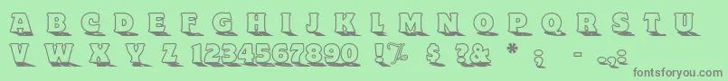 ToylandOutlinea Font – Gray Fonts on Green Background