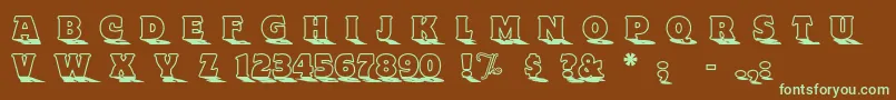 フォントToylandOutlinea – 緑色の文字が茶色の背景にあります。