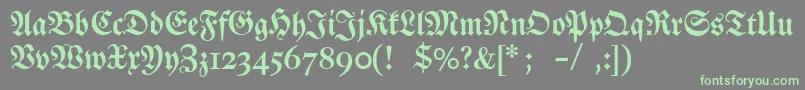 Dslutherschehalbfett-Schriftart – Grüne Schriften auf grauem Hintergrund