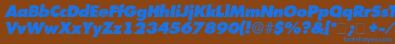 Więcej informacji o czcionce IsomarDisplayExpandedSsiExpandedItalic Czcionka IsomarDisplayExpandedSsiExpandedItalic – niebieskie czcionki na brązowym tle