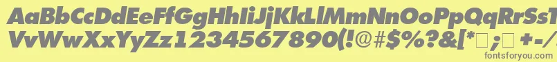 フォントIsomarDisplayExpandedSsiExpandedItalic – 黄色の背景に灰色の文字