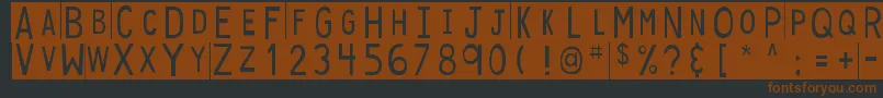 Czcionka DjbStickyTapeLabelsStrips – brązowe czcionki na czarnym tle