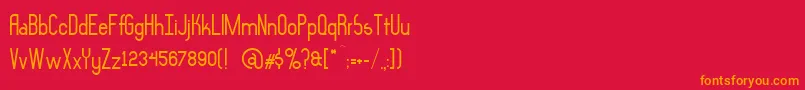 フォントAsymek – 赤い背景にオレンジの文字