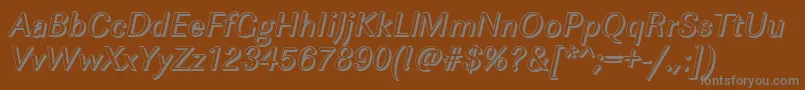 ImperialshItalic-fontti – harmaat kirjasimet ruskealla taustalla