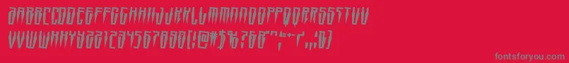 Swordtoothrotate2-Schriftart – Graue Schriften auf rotem Hintergrund