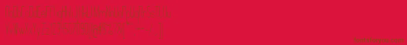 Czcionka MontepetrumRegular – brązowe czcionki na czerwonym tle