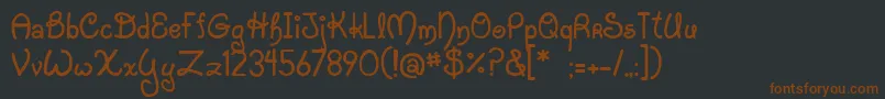 JiStarfish Font – Brown Fonts on Black Background