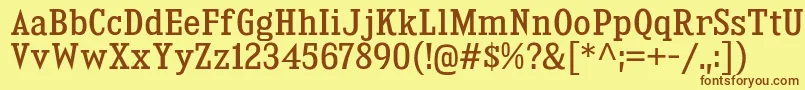 フォントKingsbridgeScRg – 茶色の文字が黄色の背景にあります。