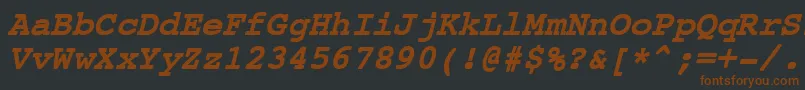 CourierNewBoldItalic-fontti – ruskeat fontit mustalla taustalla