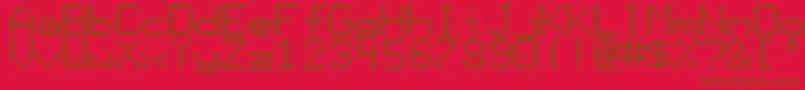 Display-fontti – ruskeat fontit punaisella taustalla