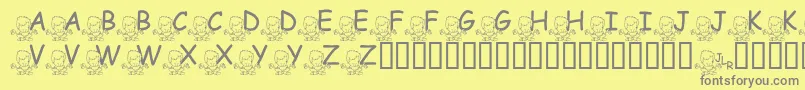 FlMeditatinNate-fontti – harmaat kirjasimet keltaisella taustalla