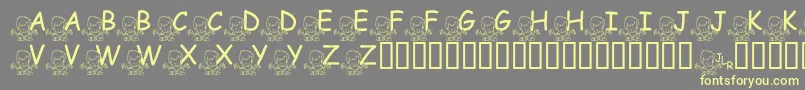 Шрифт FlMeditatinNate – жёлтые шрифты на сером фоне