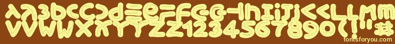 Xmasginger2005 Font – Yellow Fonts on Brown Background