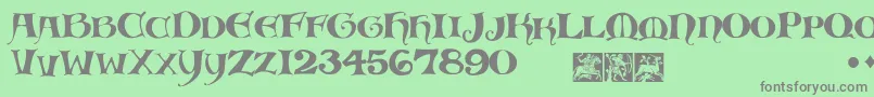 フォントMedievalScribish – 緑の背景に灰色の文字