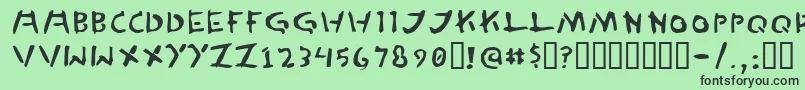 フォントTedCannon – 緑の背景に黒い文字