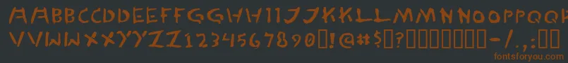 フォントTedCannon – 黒い背景に茶色のフォント